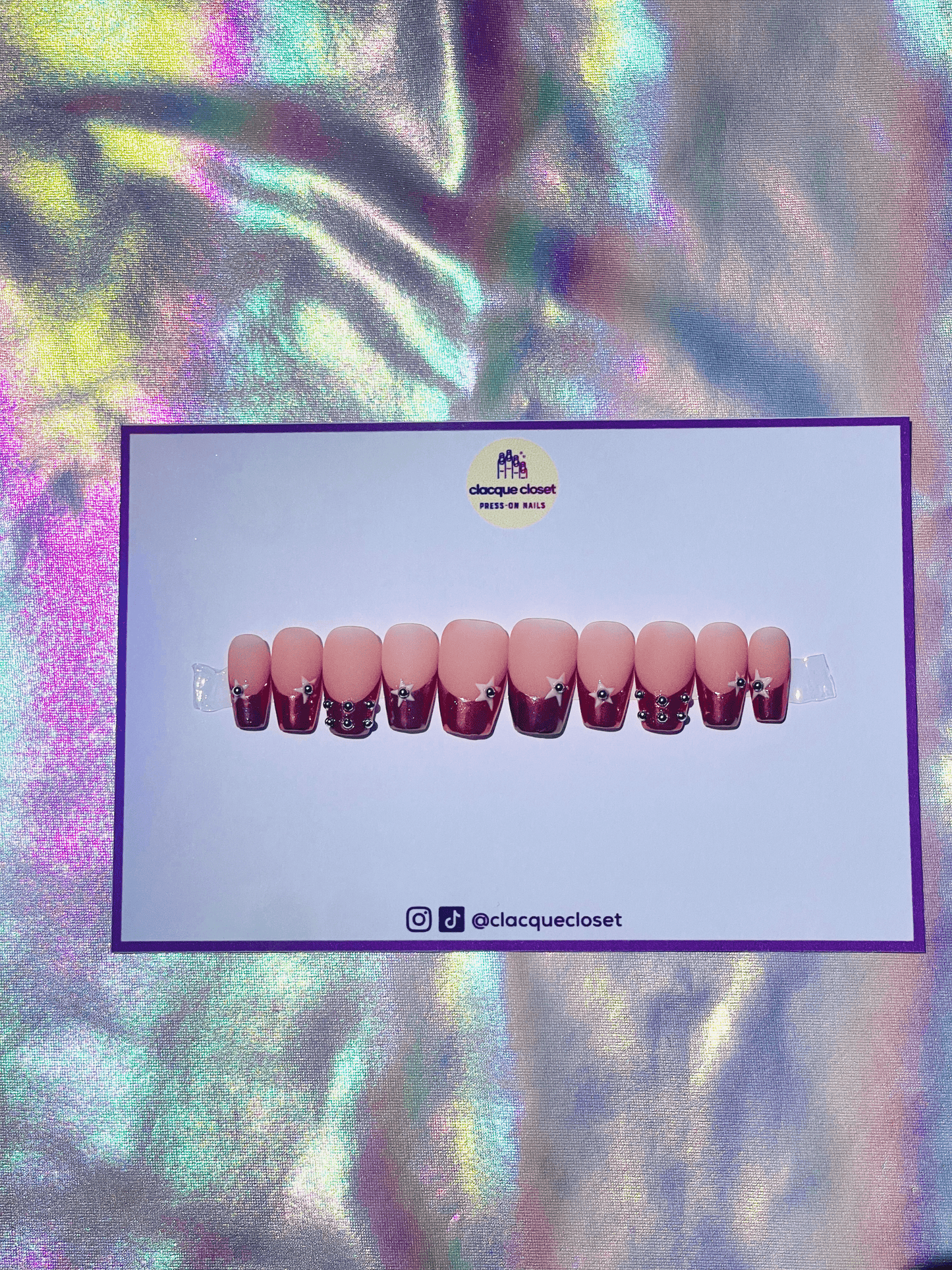 Short coffin-shaped press-on nails in pink chrome with a chic French tip design for a sleek and modern look.