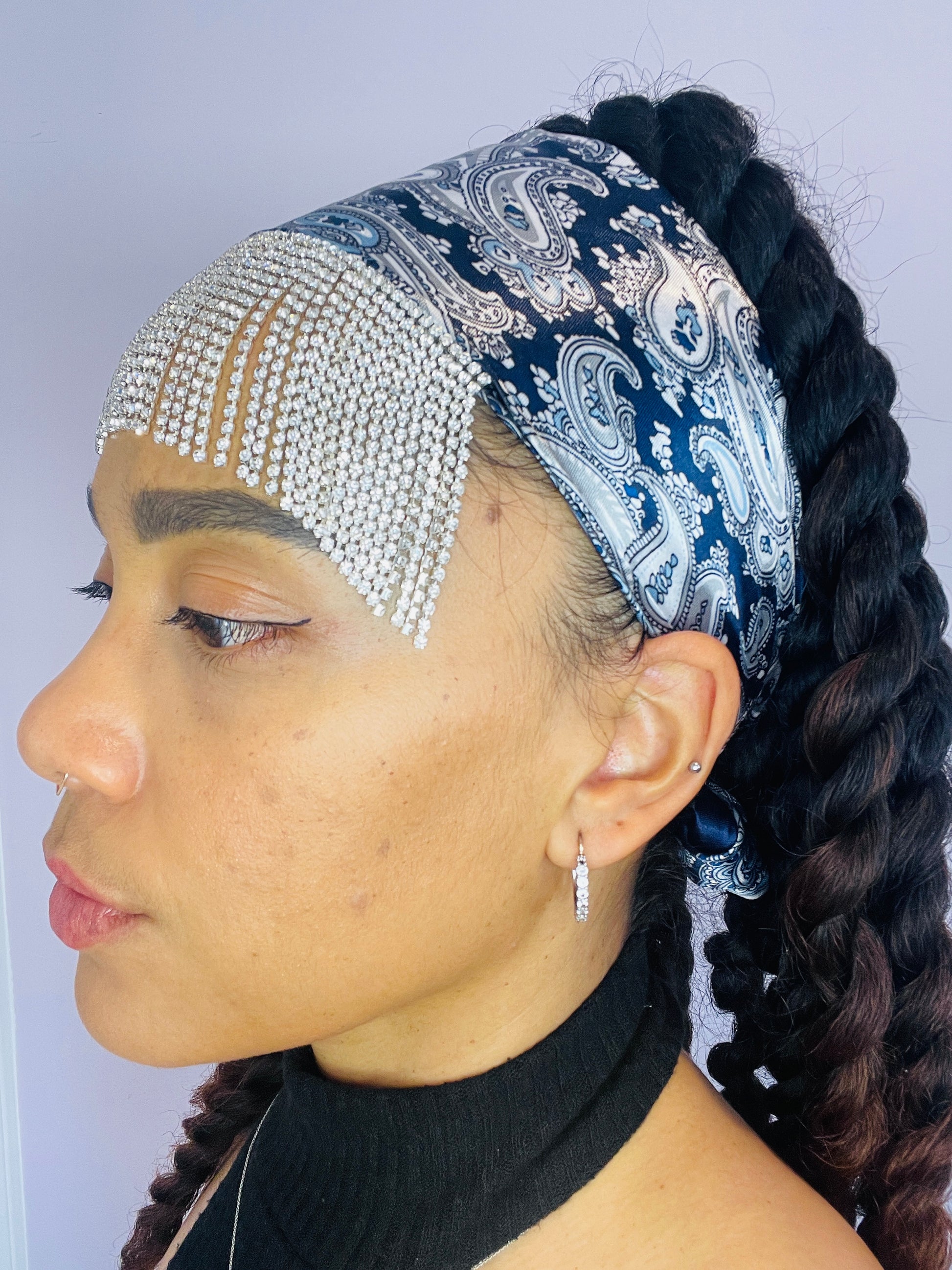 Side angle of the Midnight Eve bandana showing its paisley pattern and sparkly fringe