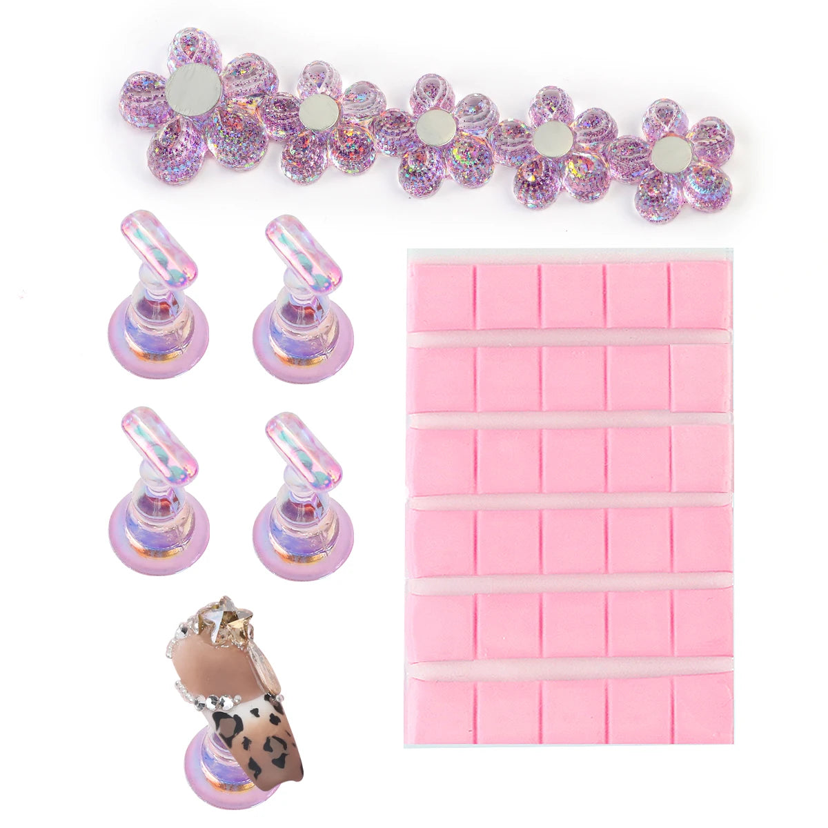 Set of pink silicone molds with decorative elements on a white background