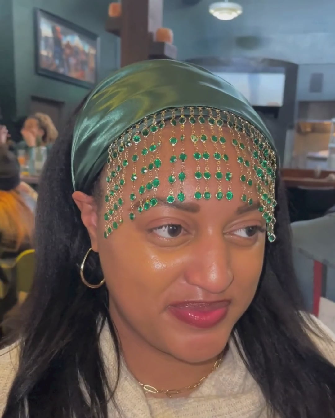 video of customer wearing Demeter green bandana bangs